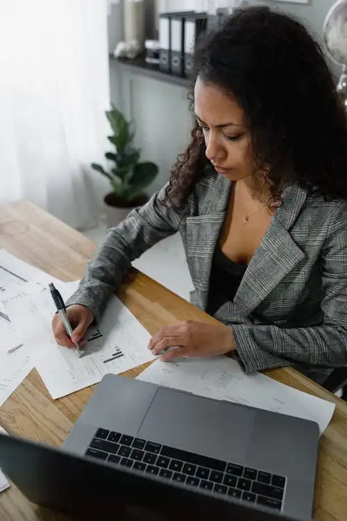 female accountant working with laptop